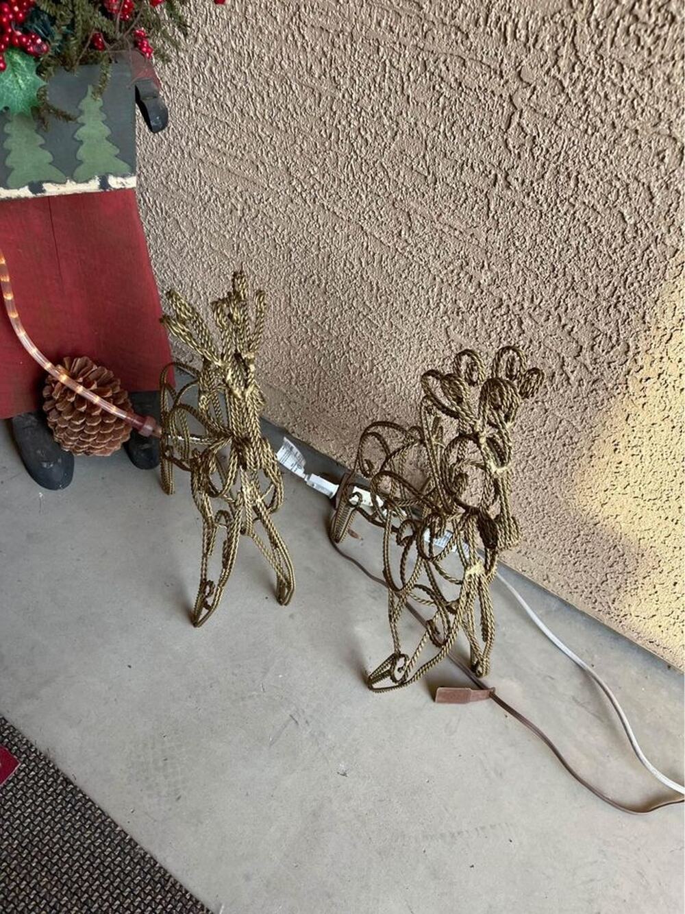 Two wrought iron Christmas Reindeer Gold filigree decorations
